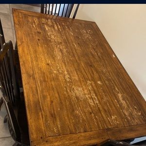 5 chairs and eatable dining room table